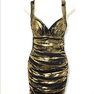 XOXO Gold and black dress. Dress has side …